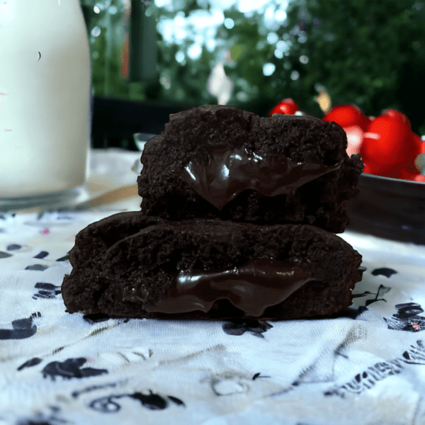 A close up of two brownies on top of a table