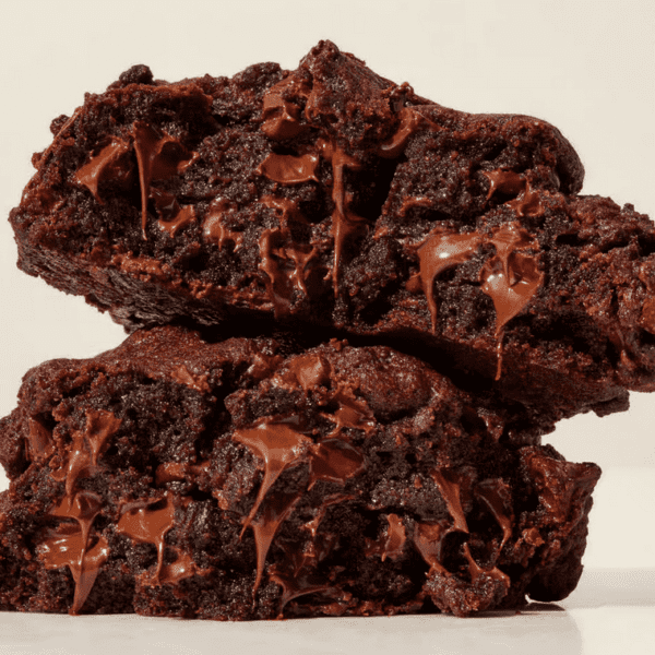 A stack of chocolate brownies on top of each other.