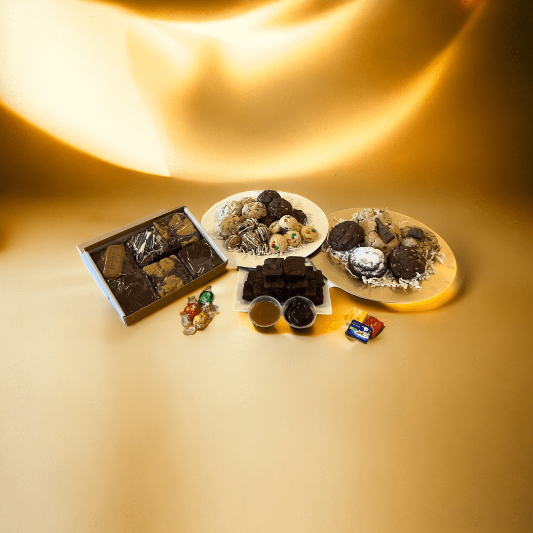 A table with some chocolate and cookies on it