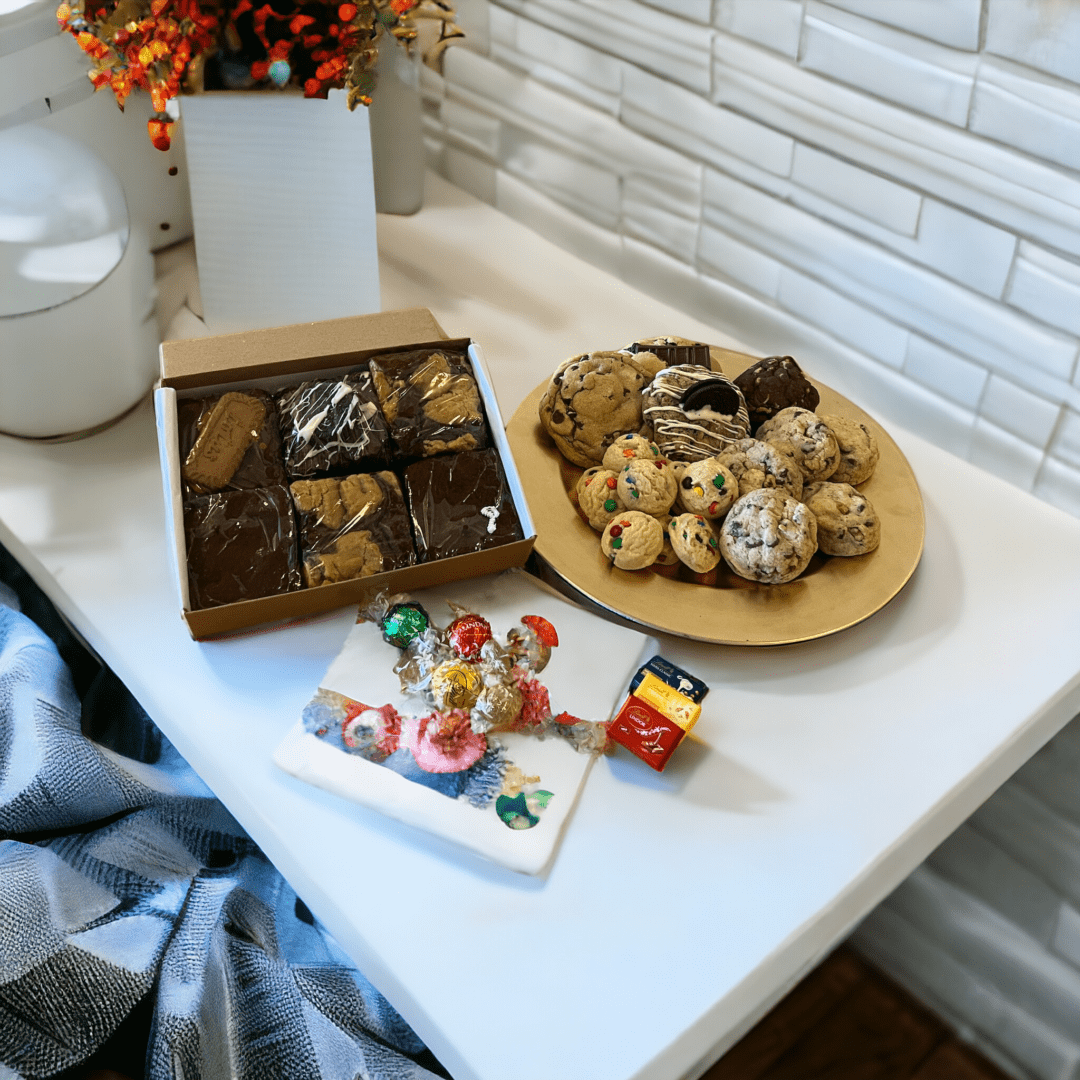 A table with some cookies and other treats on it