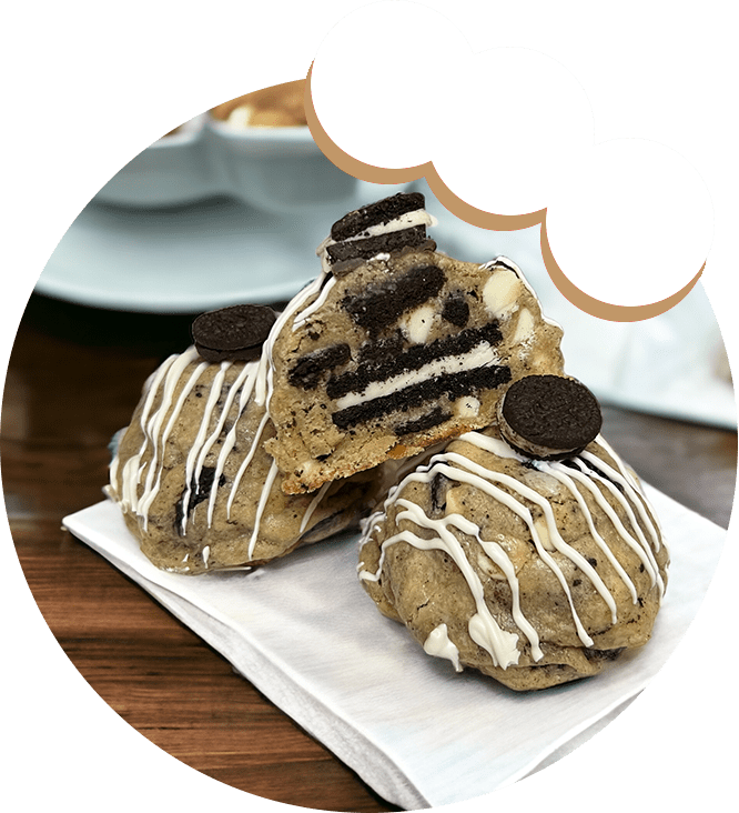 Cookies and cream cookies are on a napkin.