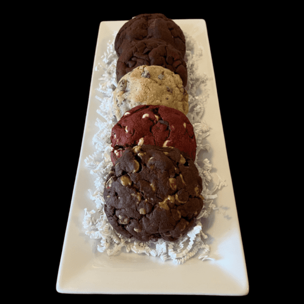 A white plate topped with cookies and rice.