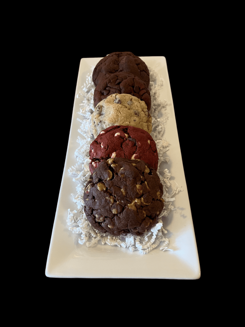 A white plate topped with cookies and rice.