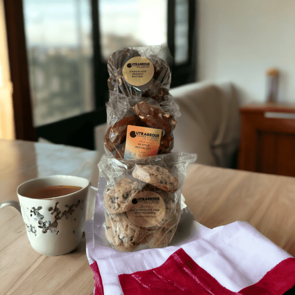 A bag of cookies and cup on the table