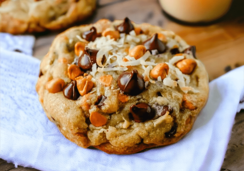 A cookie sitting on top of a napkin.